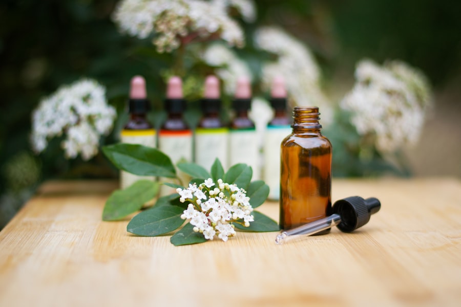 Homoeopathic remedy bottles with a dropper and fresh flowers